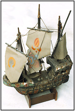 The ship model with the horn speaker inside its hull.